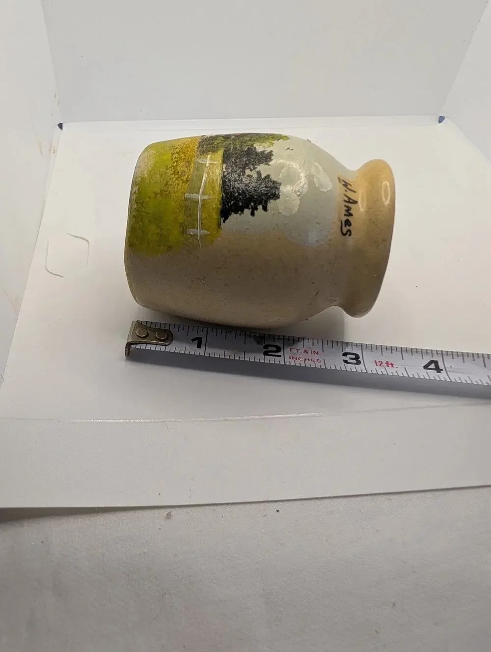 hand-painted pottery jug signed by the artist W. Ames
